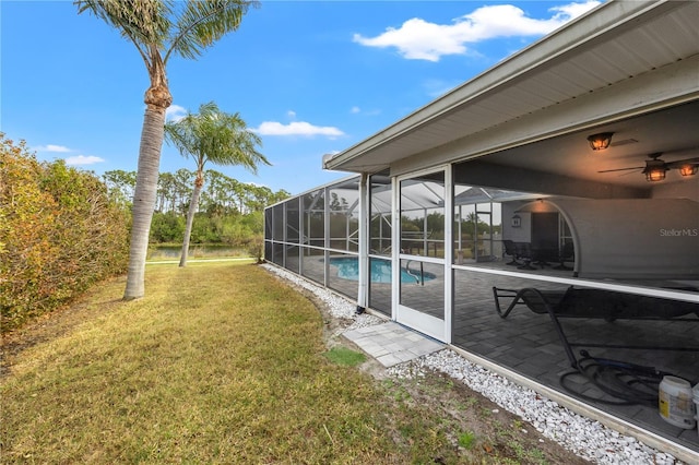 view of yard featuring a lanai and a patio