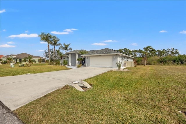 single story home featuring a garage and a front yard