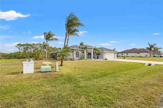 single story home with a garage and a front yard