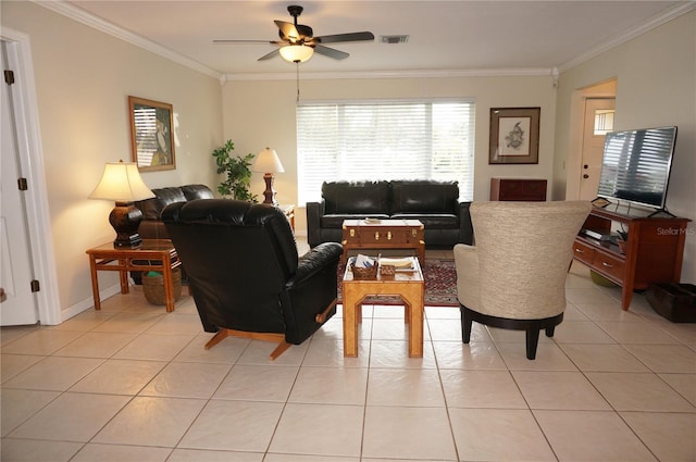 living room featuring crown molding, light tile patterned floors, and ceiling fan