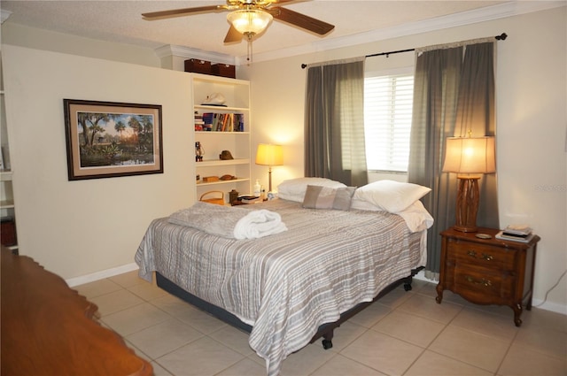 tiled bedroom featuring ceiling fan and ornamental molding