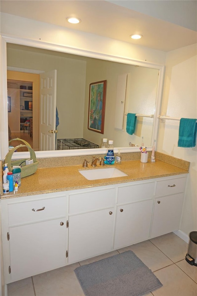 bathroom with vanity and tile patterned flooring