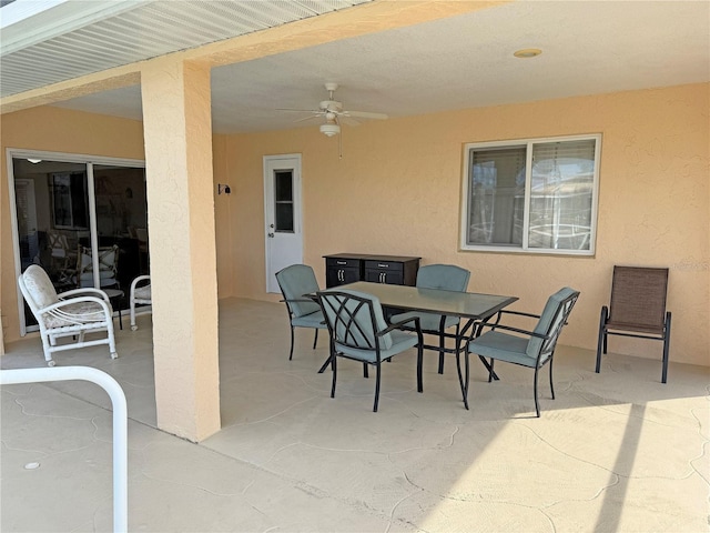 view of patio featuring ceiling fan