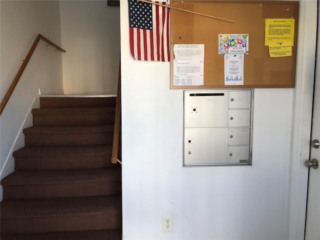 stairs featuring mail boxes