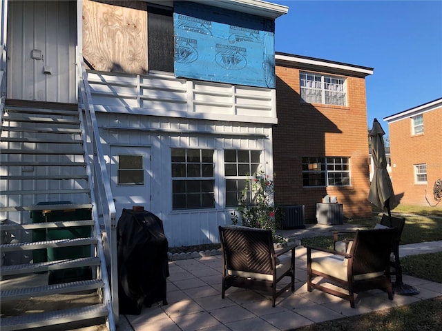 rear view of house featuring a patio area