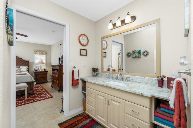 bathroom with tile patterned flooring and vanity