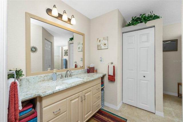 bathroom featuring vanity and tile patterned floors