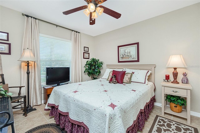 bedroom with light tile patterned flooring and ceiling fan