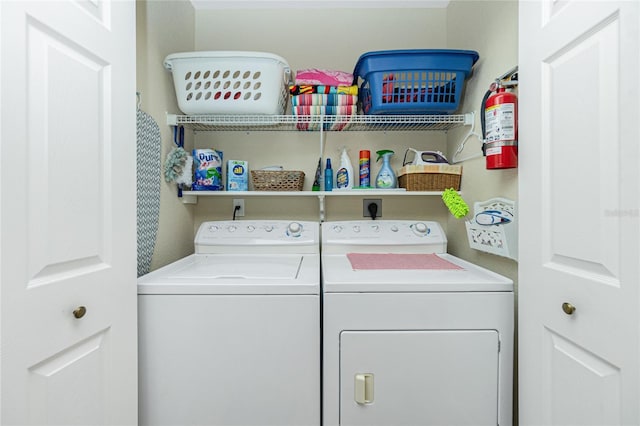 laundry area with washer and clothes dryer