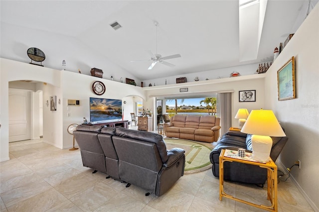 living room featuring lofted ceiling and ceiling fan