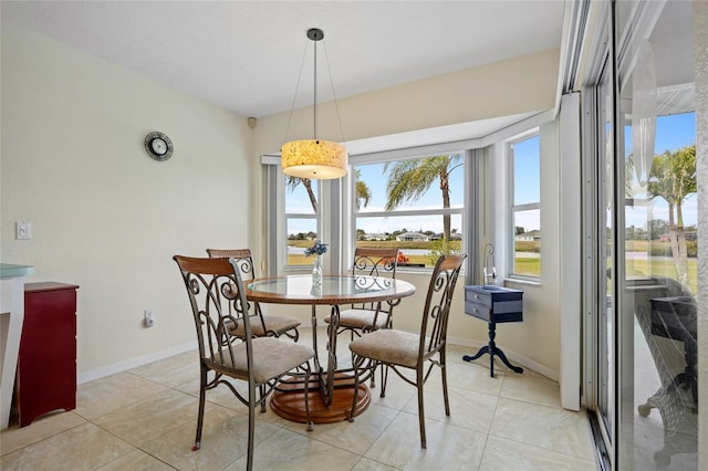 view of tiled dining space