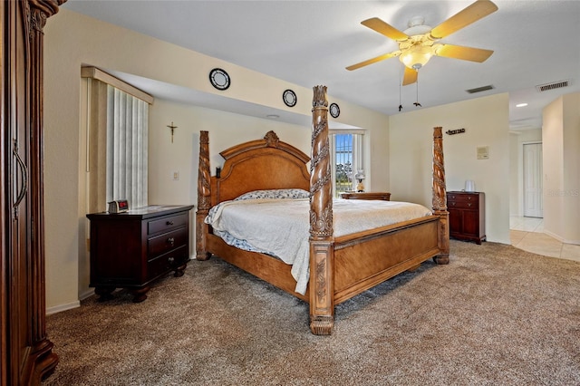 bedroom with ceiling fan and carpet floors