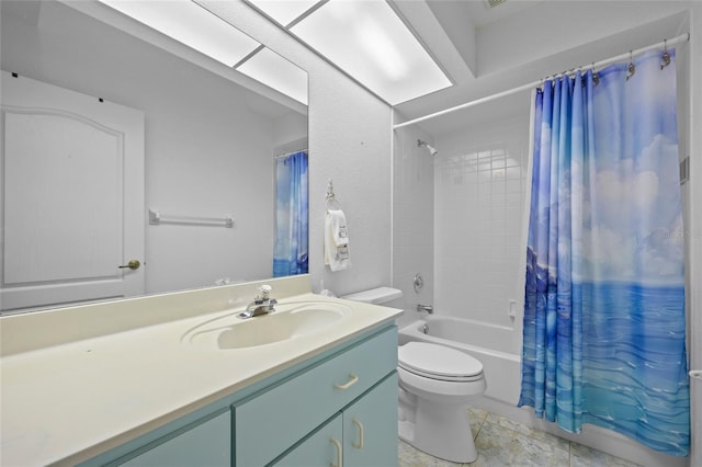 full bathroom with tile patterned floors, vanity, toilet, and shower / bath combo