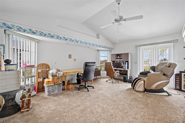 office area with plenty of natural light, carpet flooring, lofted ceiling, and ceiling fan