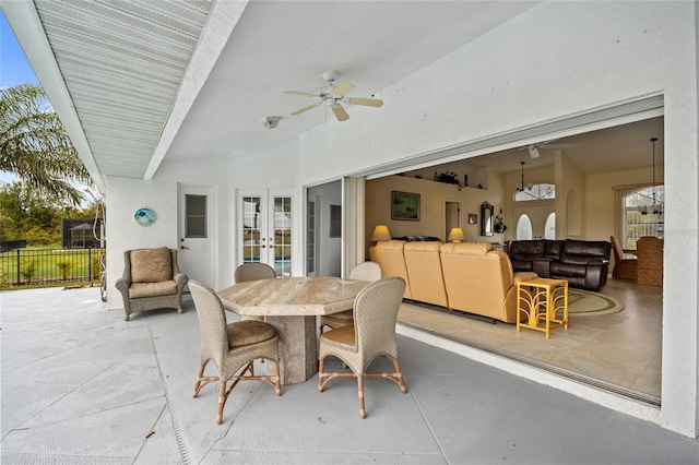 view of patio / terrace featuring outdoor lounge area, french doors, and ceiling fan