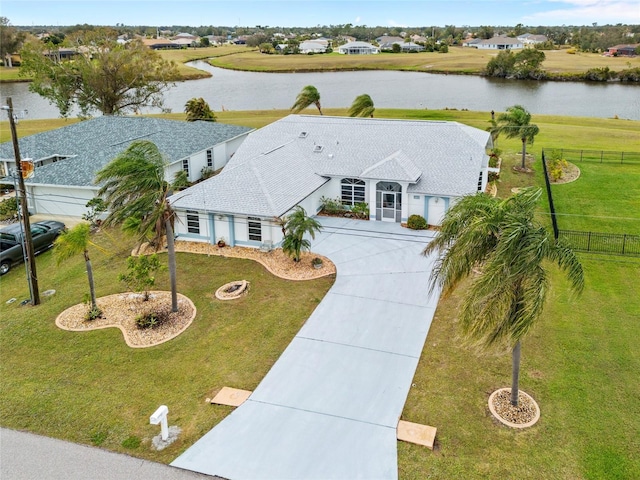 bird's eye view with a water view