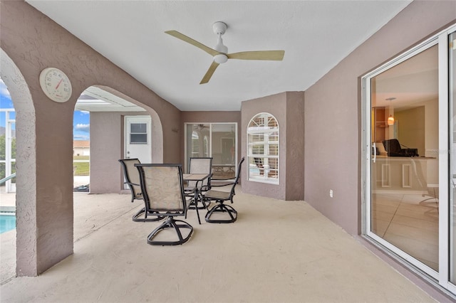 view of patio / terrace featuring ceiling fan