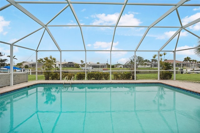 view of pool with a lanai