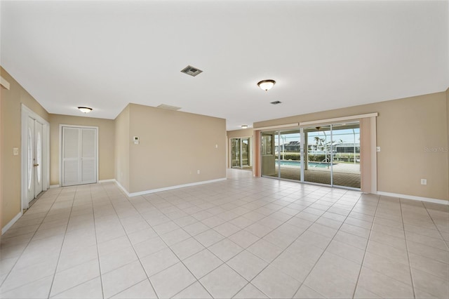 view of tiled spare room