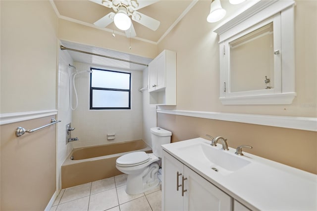 full bathroom featuring toilet, tile patterned flooring, ornamental molding, vanity, and tiled shower / bath