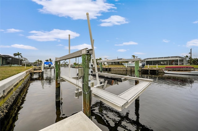 dock area featuring a water view