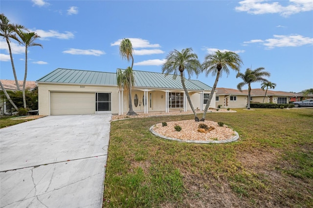 ranch-style house with a garage and a front yard