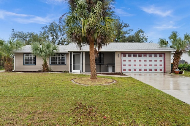 single story home featuring a garage and a front yard