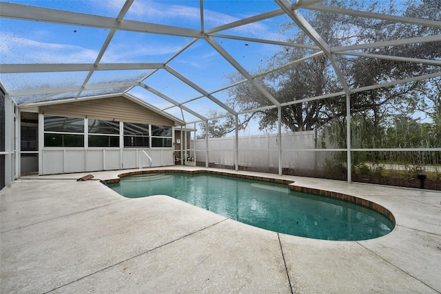 view of pool featuring a patio area and a lanai