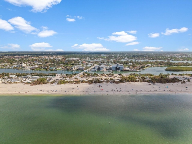 bird's eye view featuring a water view and a view of the beach