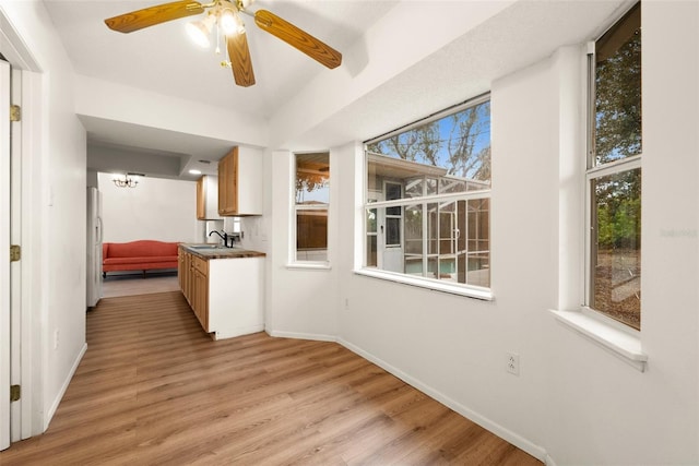 interior space with sink and light hardwood / wood-style floors