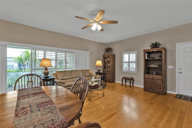 dining room featuring ceiling fan and light hardwood / wood-style flooring