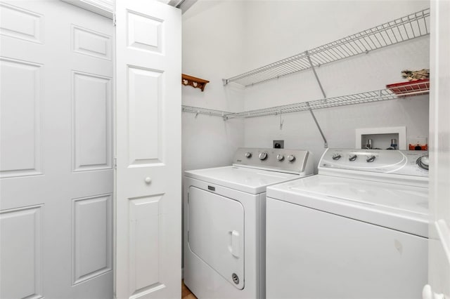 laundry area with washer and clothes dryer