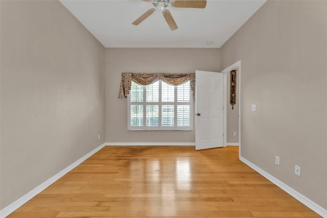 unfurnished room featuring ceiling fan and light hardwood / wood-style floors