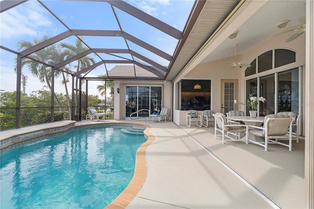 view of swimming pool with a patio area, a lanai, ceiling fan, and an outdoor hangout area