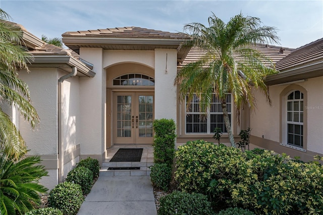 entrance to property featuring french doors