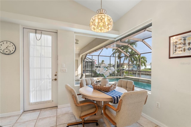 tiled dining room with a healthy amount of sunlight