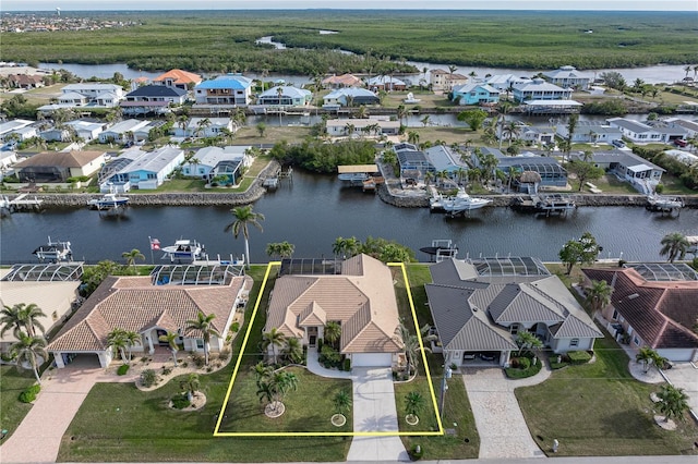 drone / aerial view featuring a water view