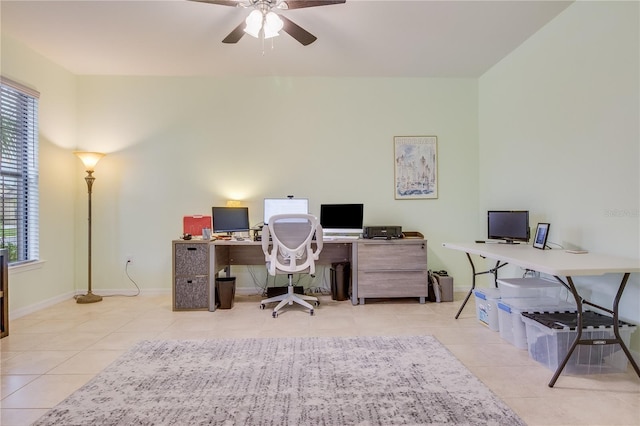 tiled home office with ceiling fan