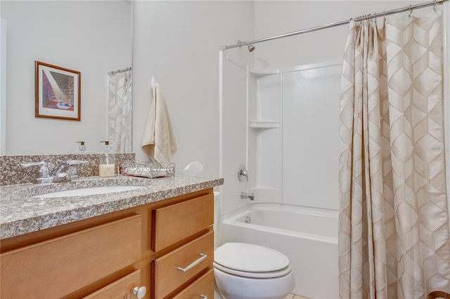 full bathroom with toilet, vanity, and shower / tub combo with curtain