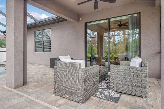 view of patio featuring ceiling fan and outdoor lounge area