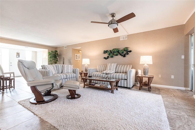 living room with ceiling fan