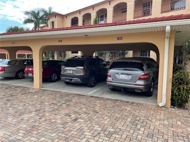 view of car parking featuring a carport