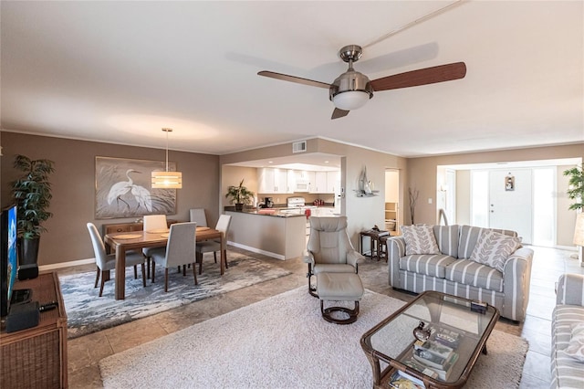 living room featuring ceiling fan