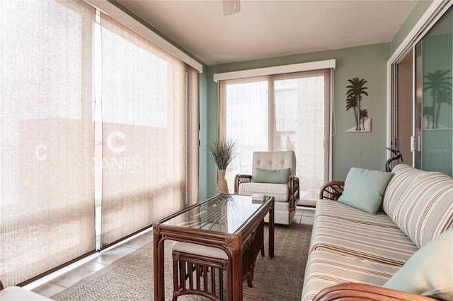 living room with tile patterned flooring