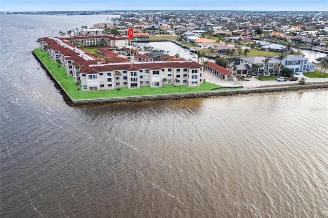 bird's eye view featuring a residential view and a water view