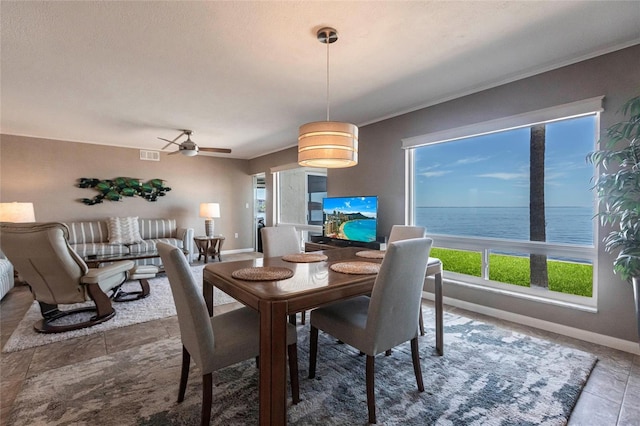 1 Colony Point Dr Unit A19, Punta Gorda, FL 33950 - dining space with baseboards, visible vents, and ceiling fan