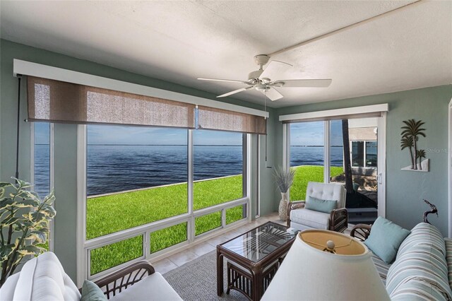 1 Colony Point Dr Unit A19, Punta Gorda, FL 33950 - sunroom / solarium featuring a water view and a ceiling fan