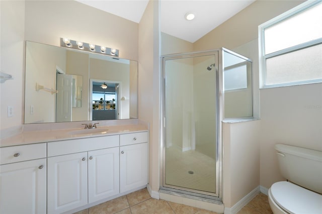 bathroom featuring lofted ceiling, tile patterned flooring, vanity, toilet, and a shower with door