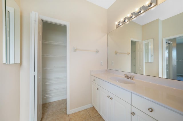 bathroom featuring tile patterned floors and vanity