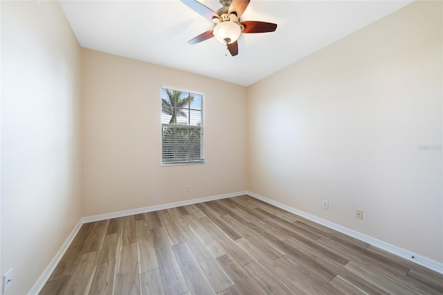 unfurnished room with ceiling fan and light hardwood / wood-style flooring